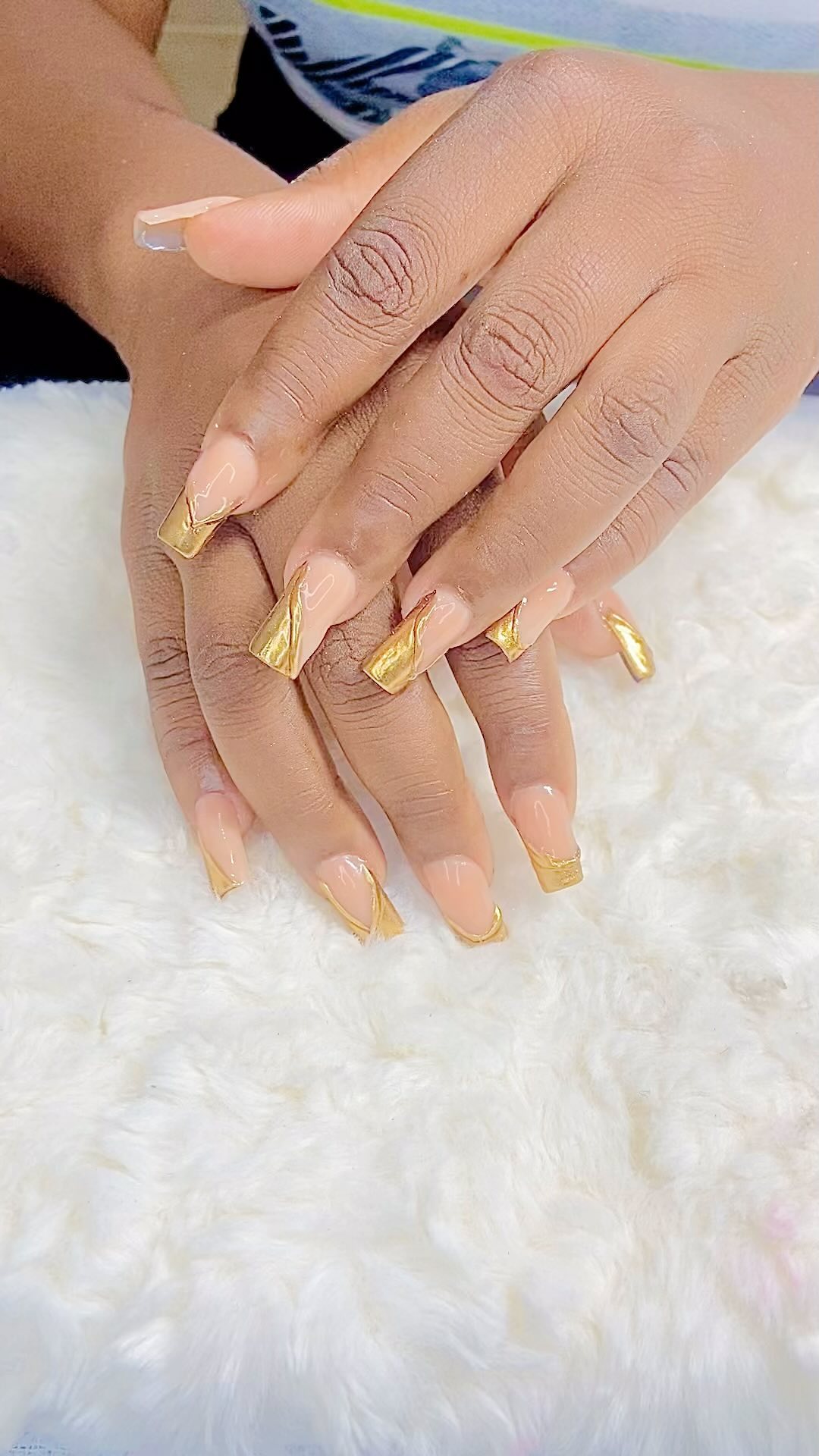 Elegant Nude and Gold Nail Design