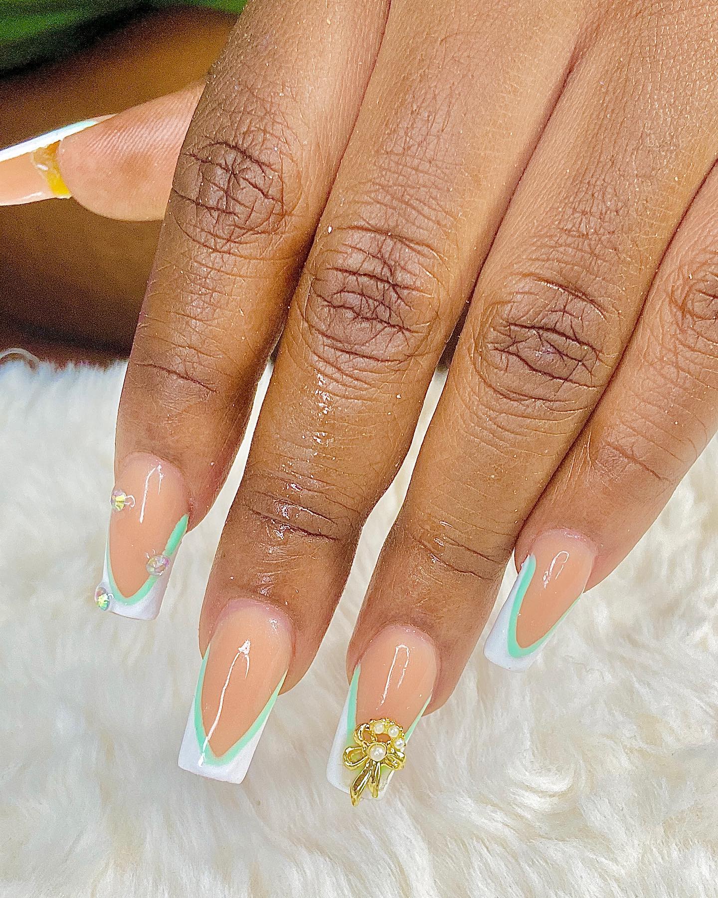 Elegant French Tip Nails with Floral Accents