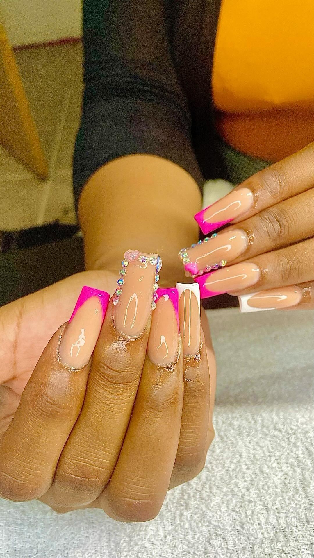 Nail Art with Pink French Tip and Gems