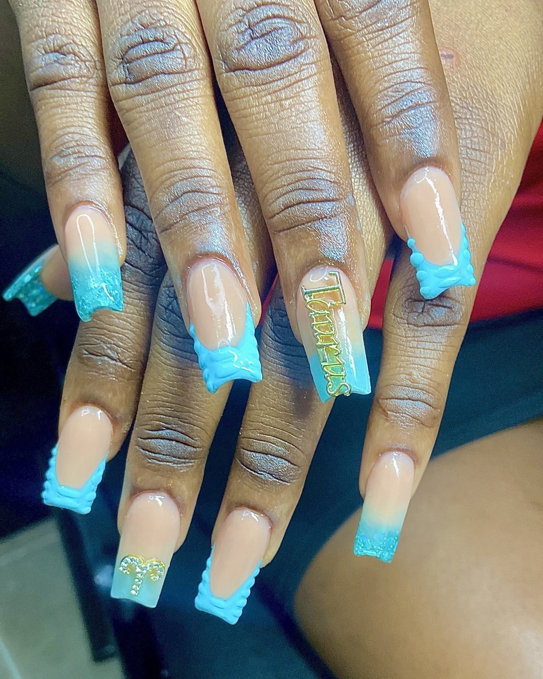 Artistic Blue and Nude Nail Design