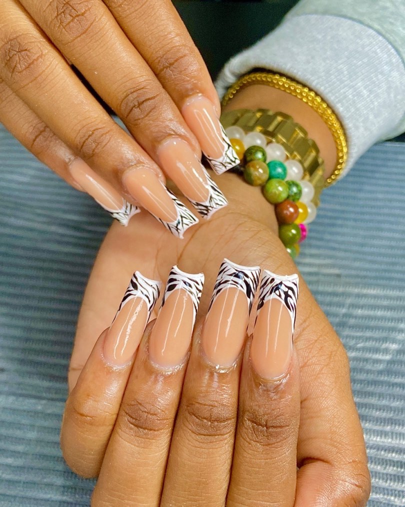 Elegant Nude and Zebra Patterned Nails