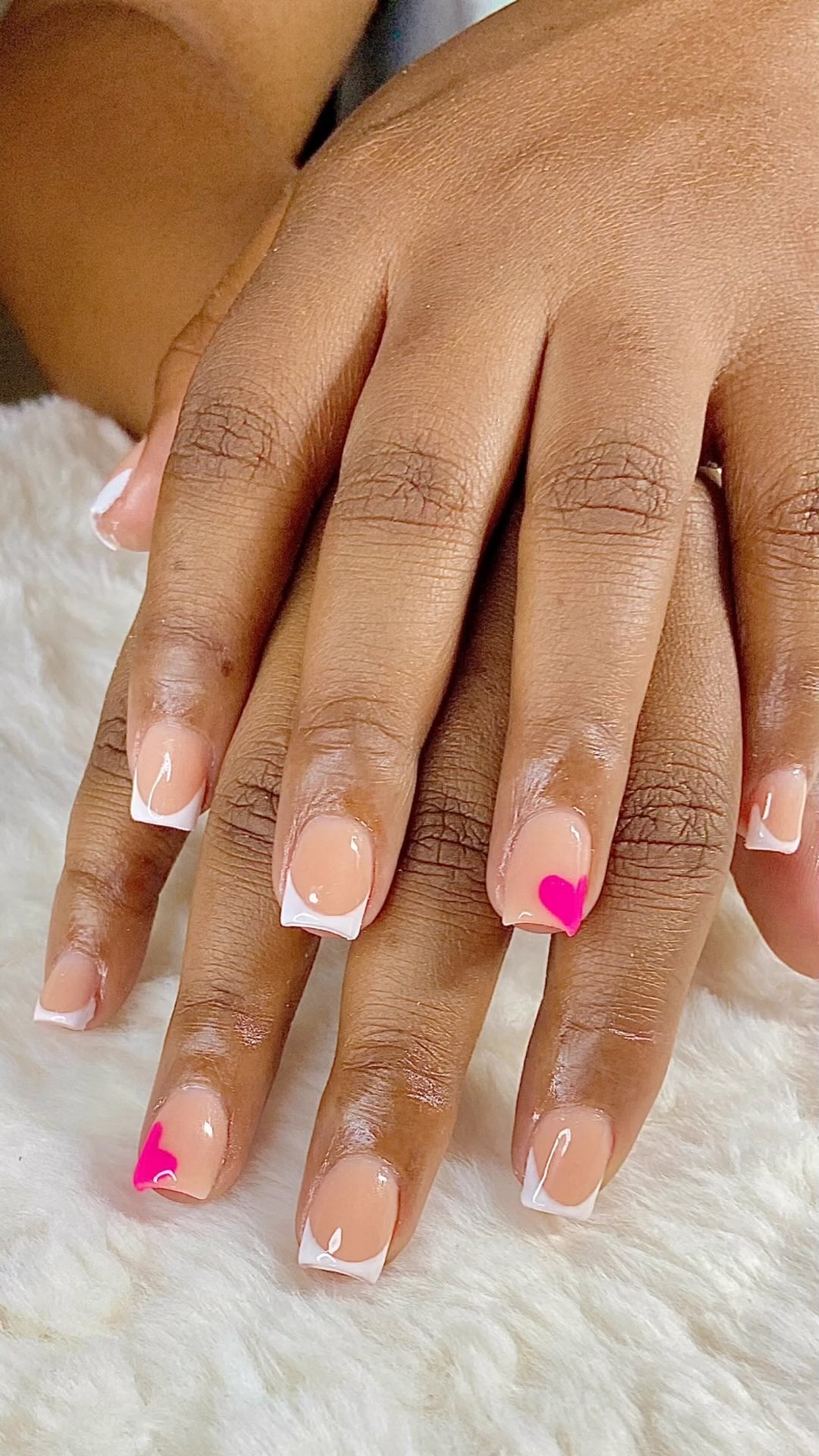 Stylish French Tip Nails with Heart Accent
