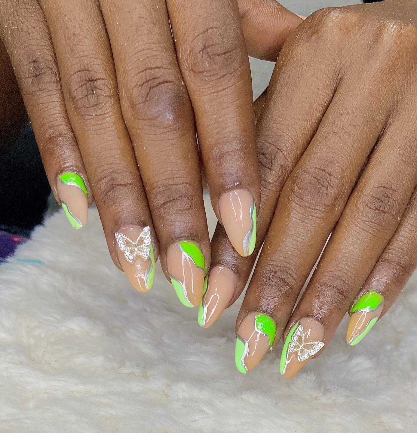 Artistic Green and Nude Nails with Butterfly