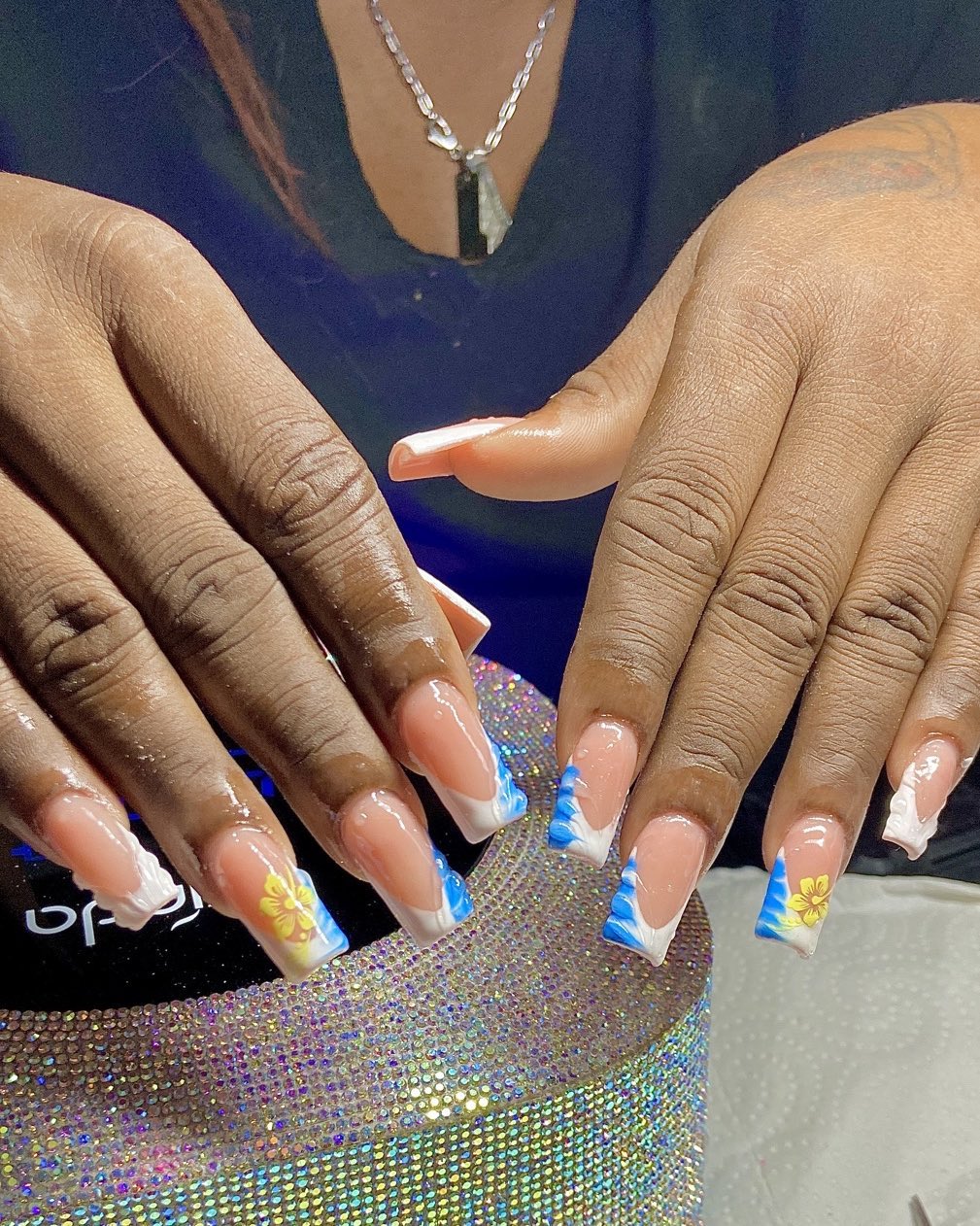Artistic Nail Design with Floral Accents