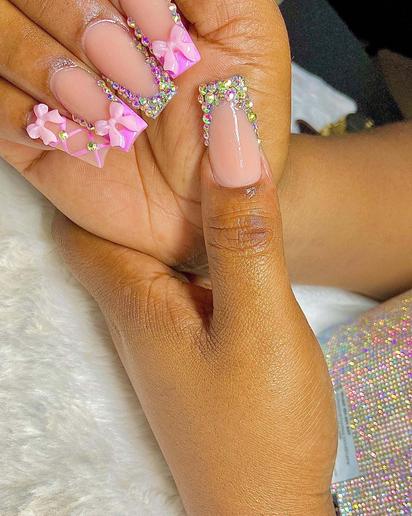 Glamorous Pink Nails with Rhinestones and Bows