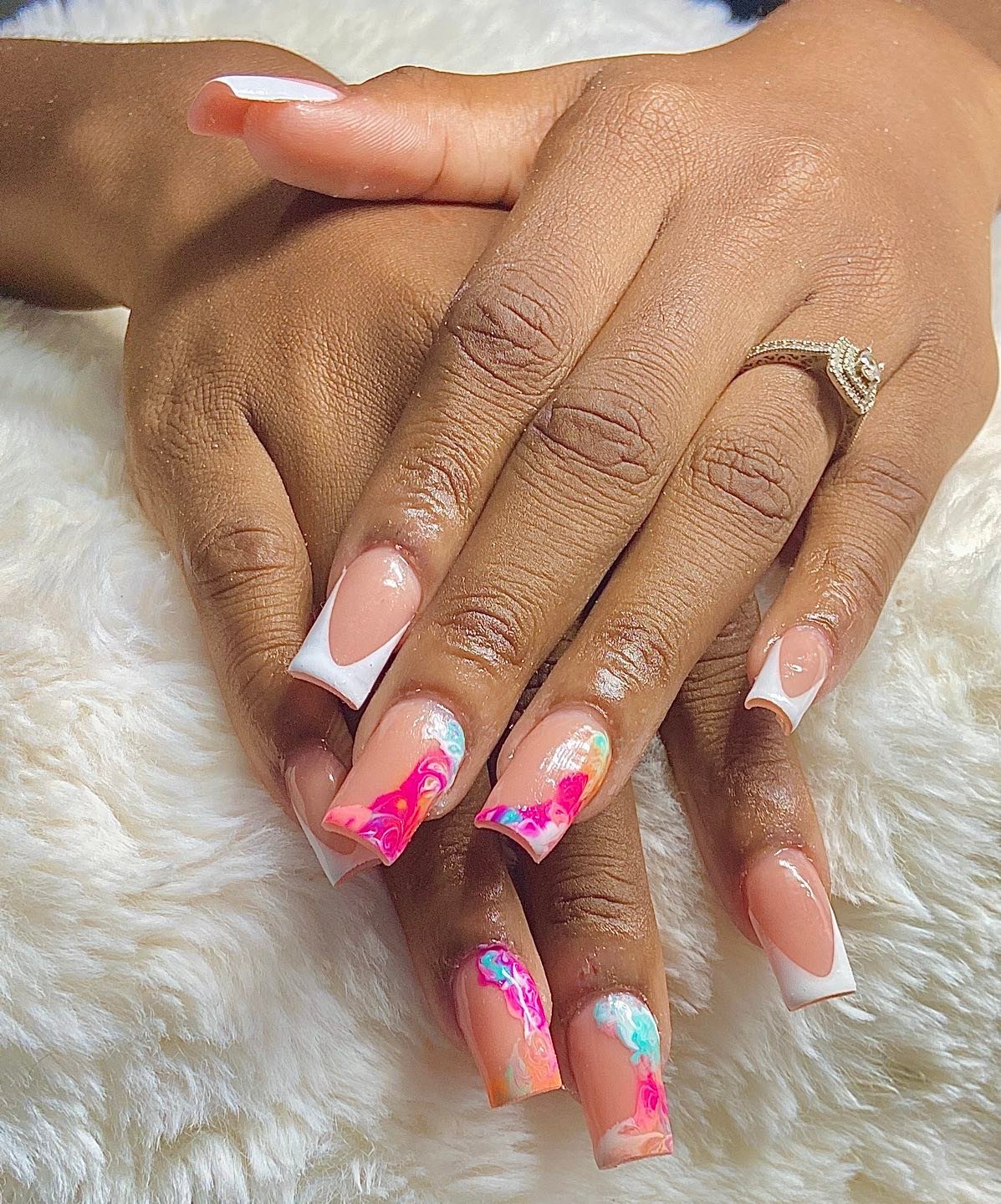 Artistic French Tip Nails with Colorful Design