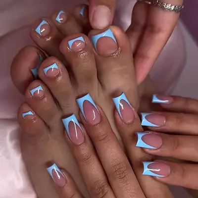 Artistic Blue and Nude Nail Design