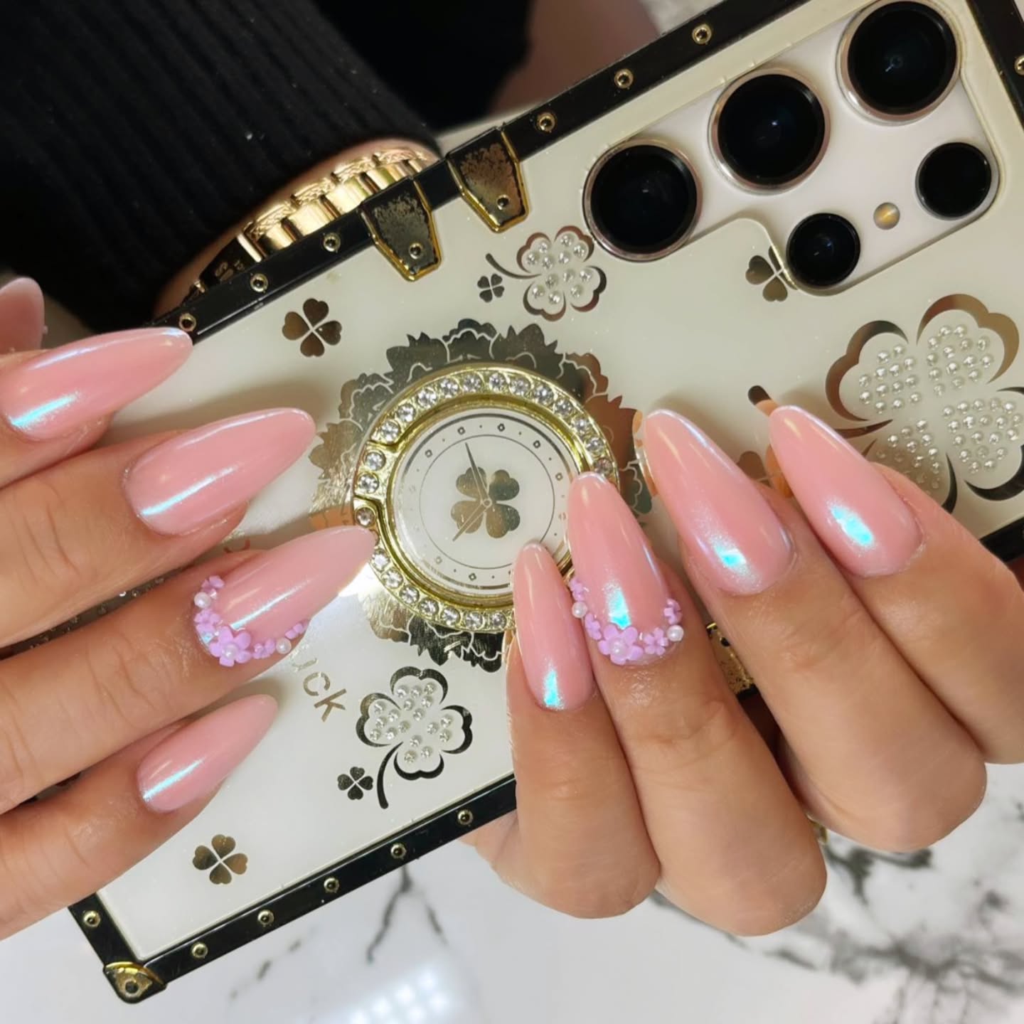 Elegant Pink Stiletto Nails with Floral Accents