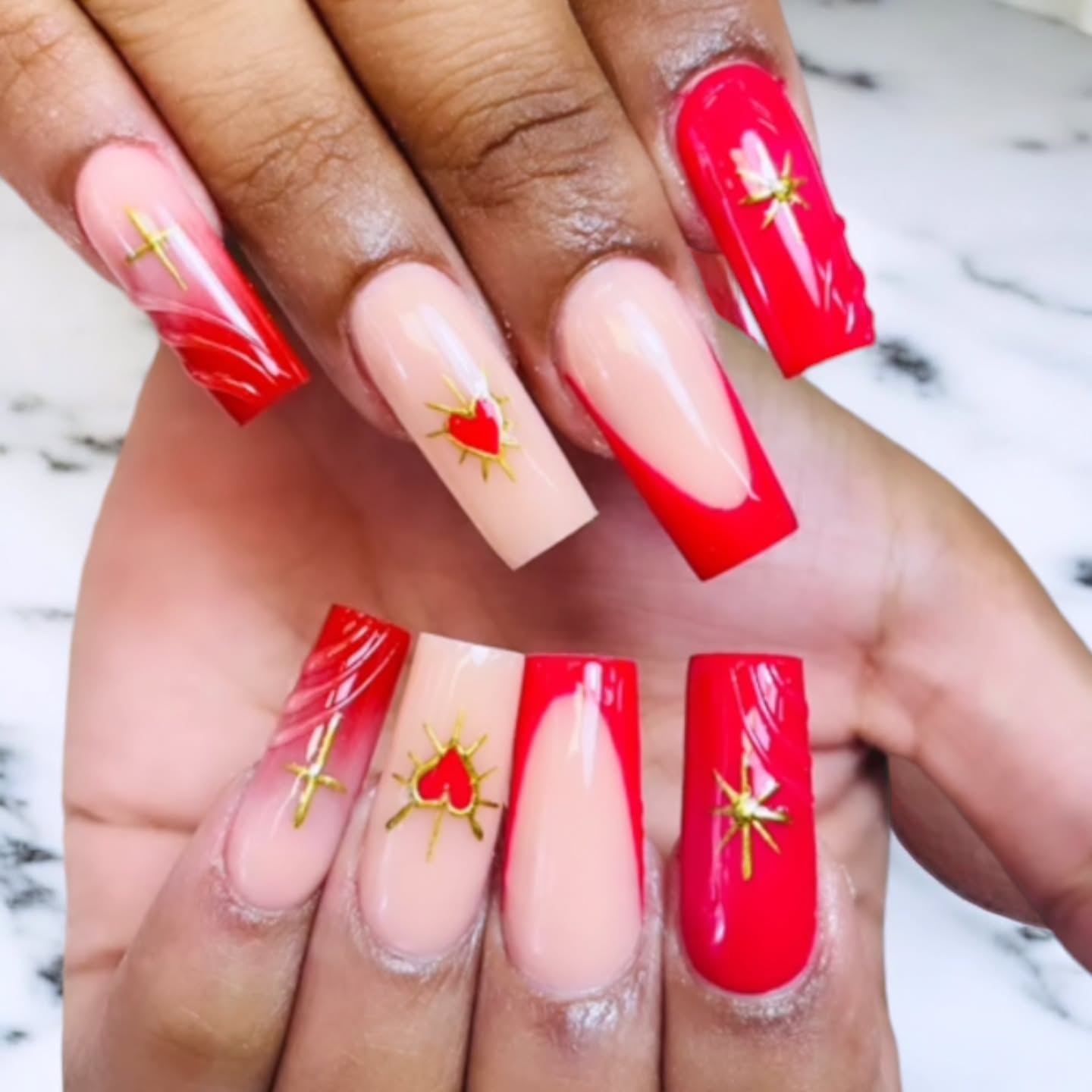 Artistic Red and Nude Nail Design