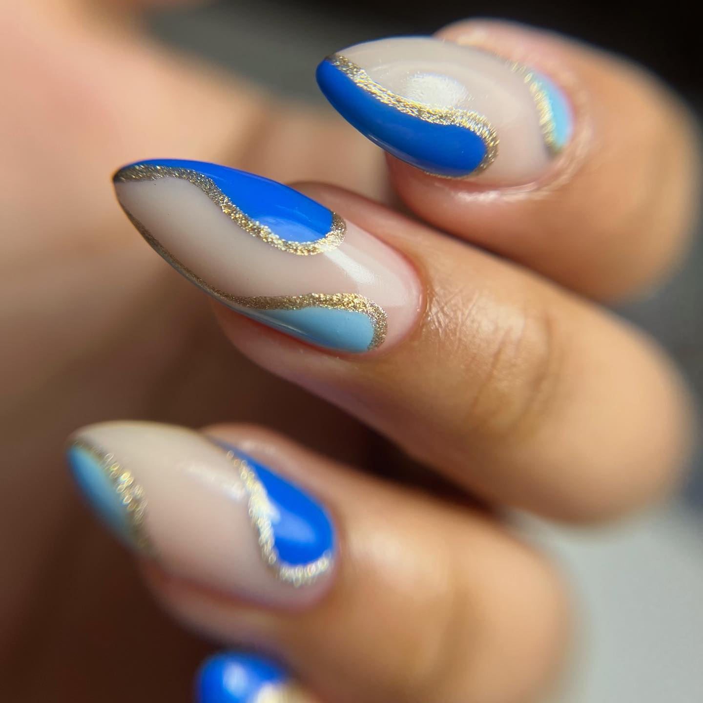 Artistic Blue and Nude Nails