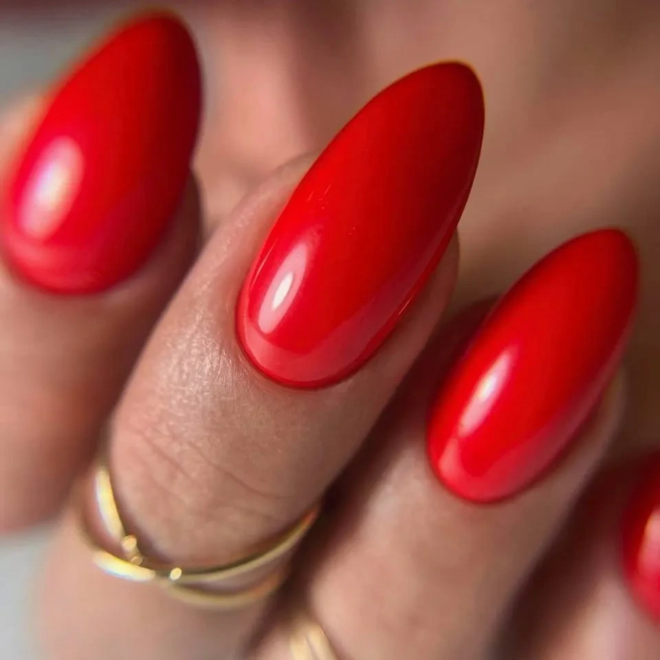 Glossy Red Stiletto Nails