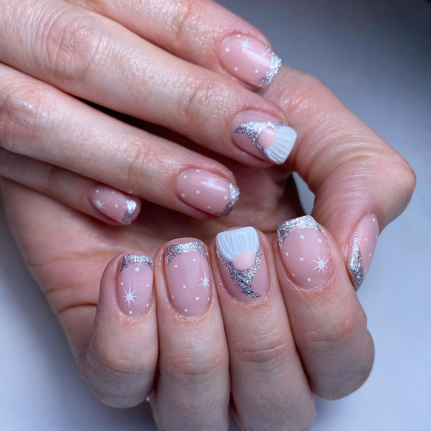 Artistic Nude and Silver Nails