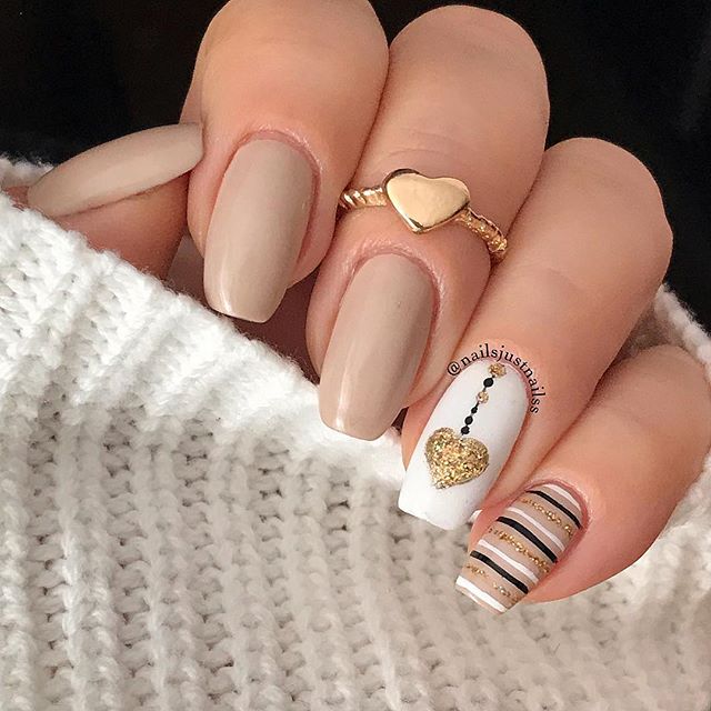 Stylish Nude Nails with Heart Accents